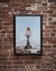 Well Balanced, painting by Robert Lange, framed on wall